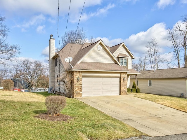 view of front of house featuring a garage, central AC, and a front lawn