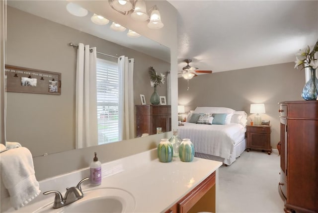 bedroom with sink and ceiling fan