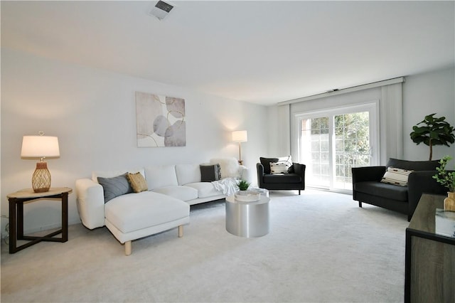 living room featuring carpet