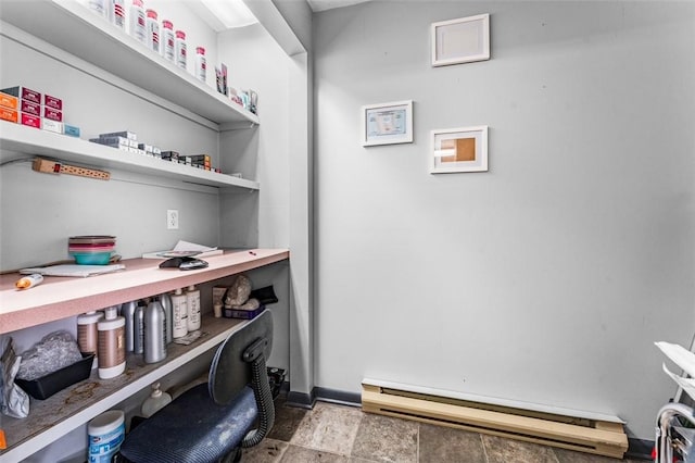 pantry featuring baseboard heating