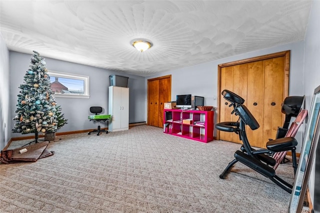 exercise room with carpet floors