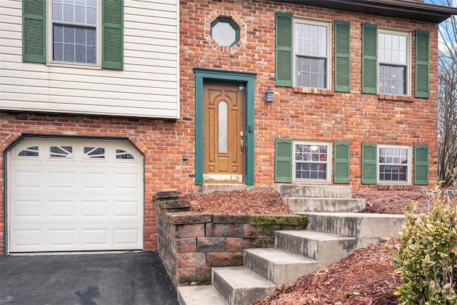 entrance to property with a garage