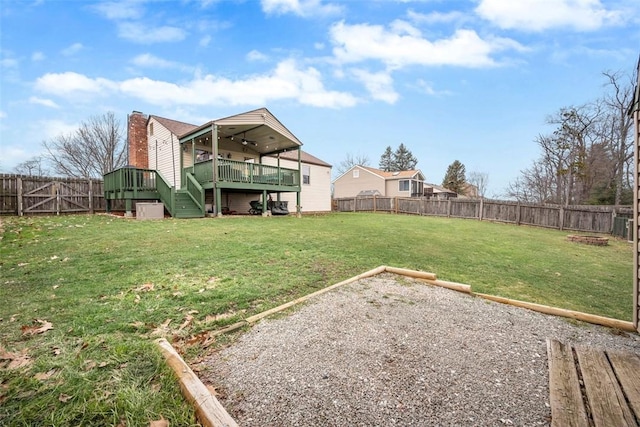 view of yard with a deck and a patio area