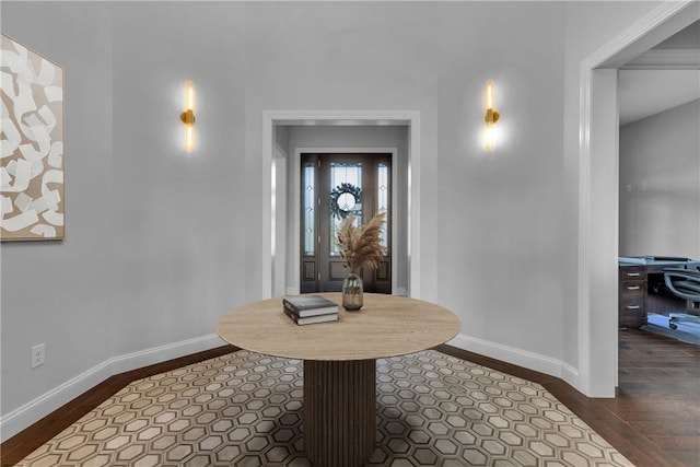 entrance foyer featuring dark hardwood / wood-style flooring