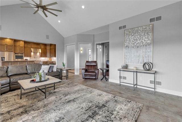 living room featuring ceiling fan and high vaulted ceiling