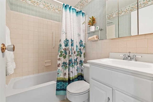 bathroom with toilet, shower / tub combo, vanity, tile walls, and backsplash