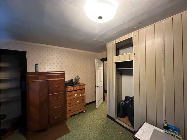 bedroom featuring dark colored carpet