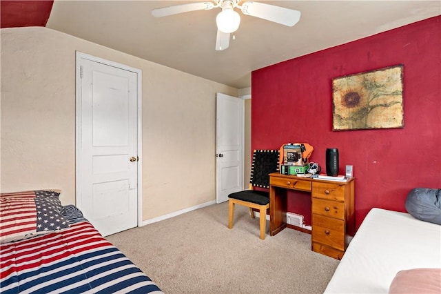 bedroom featuring lofted ceiling, light carpet, and ceiling fan