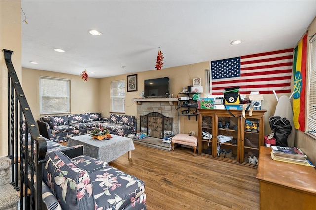 living room featuring hardwood / wood-style floors and a fireplace