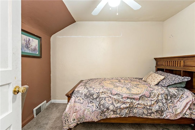 carpeted bedroom with ceiling fan and lofted ceiling