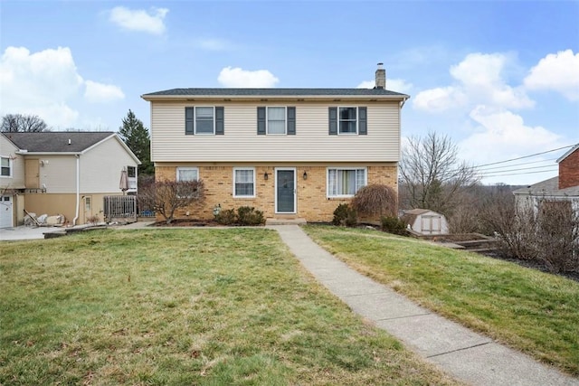 view of front of property featuring a storage shed, a front yard, and central air condition unit