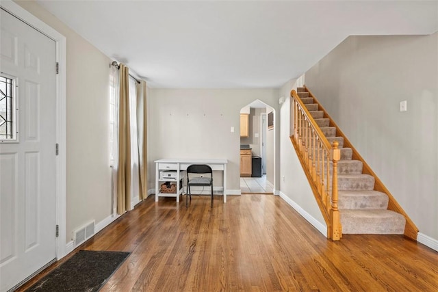 foyer entrance featuring hardwood / wood-style flooring