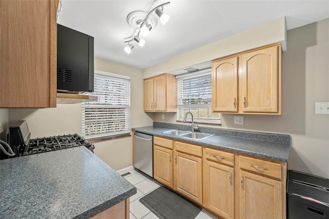 kitchen with sink, light tile patterned floors, light brown cabinets, dishwasher, and stove