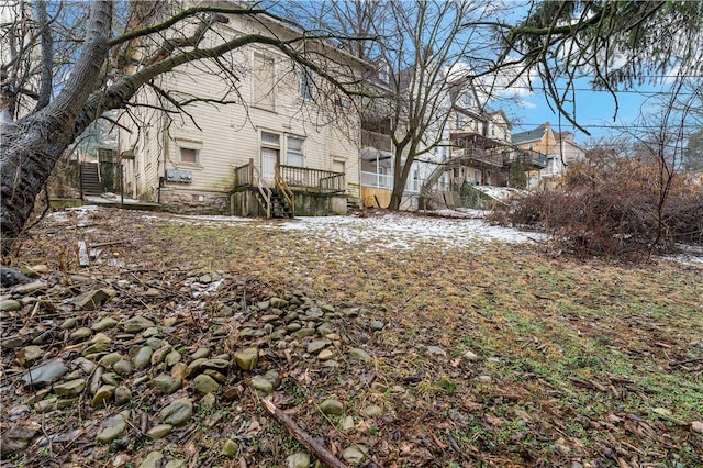 view of yard layered in snow