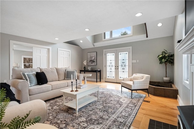 living room featuring hardwood / wood-style floors and french doors