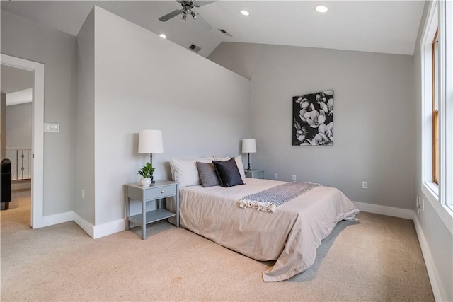 carpeted bedroom featuring ceiling fan and lofted ceiling