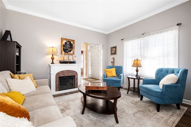 living room with wood-type flooring and crown molding