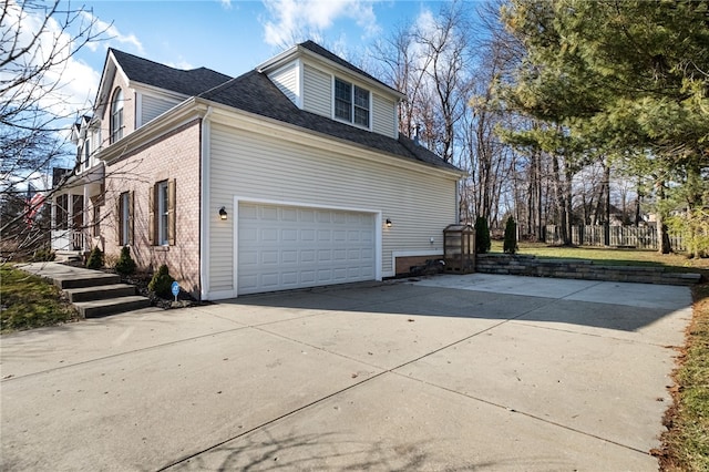 view of property exterior with a garage