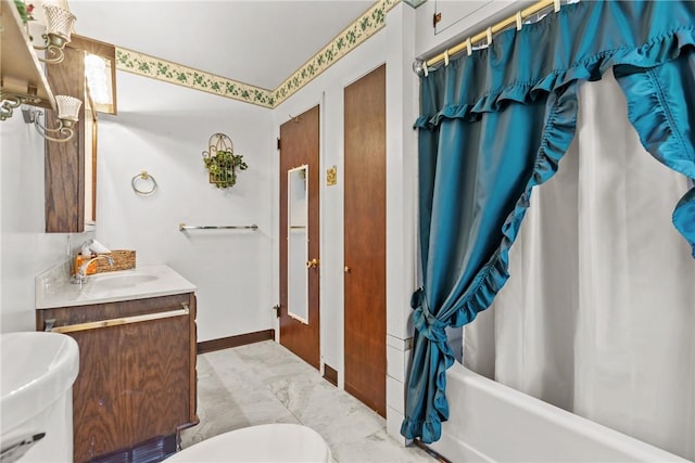 bathroom featuring vanity and shower / tub combo with curtain