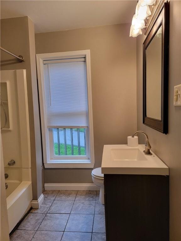 full bathroom featuring tile patterned floors, vanity, toilet, and shower / bathing tub combination