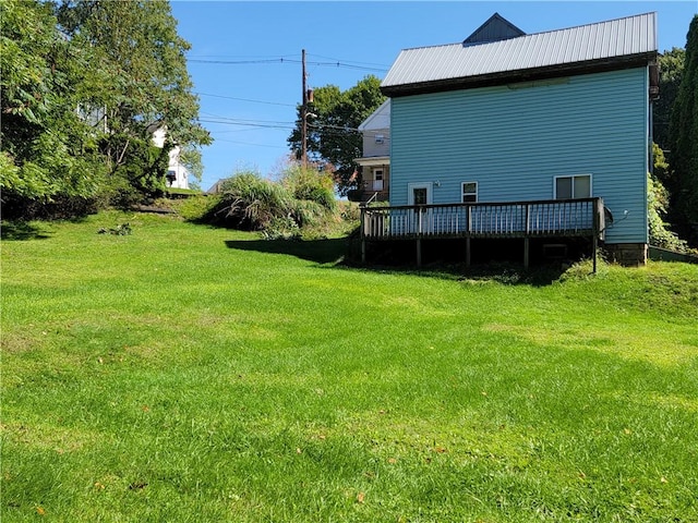 view of yard featuring a deck