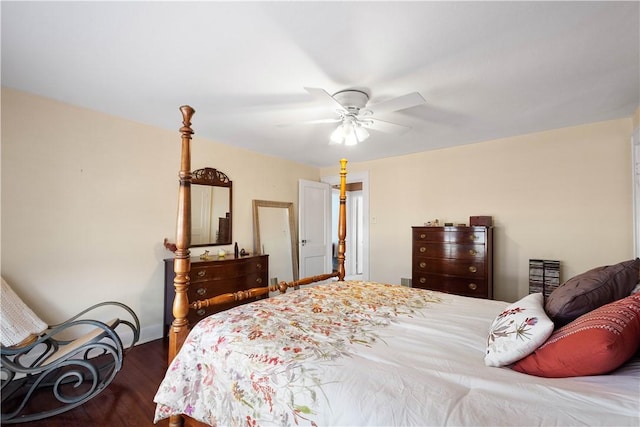 bedroom with dark wood-type flooring and ceiling fan