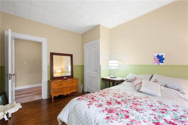 bedroom featuring dark hardwood / wood-style flooring