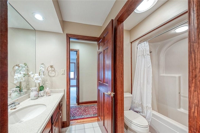 full bathroom with vanity, tile patterned flooring, toilet, and shower / bathtub combination with curtain