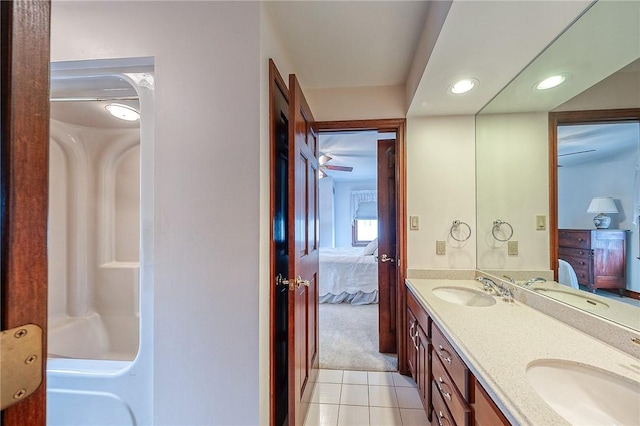 bathroom featuring tile patterned flooring and vanity