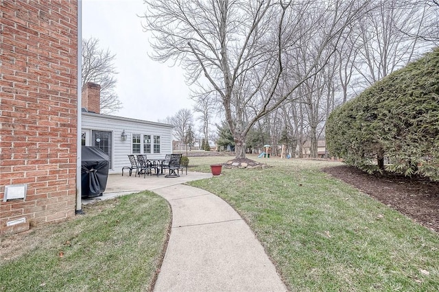 view of yard with a patio area