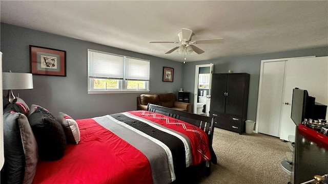 bedroom featuring a closet, ceiling fan, and carpet