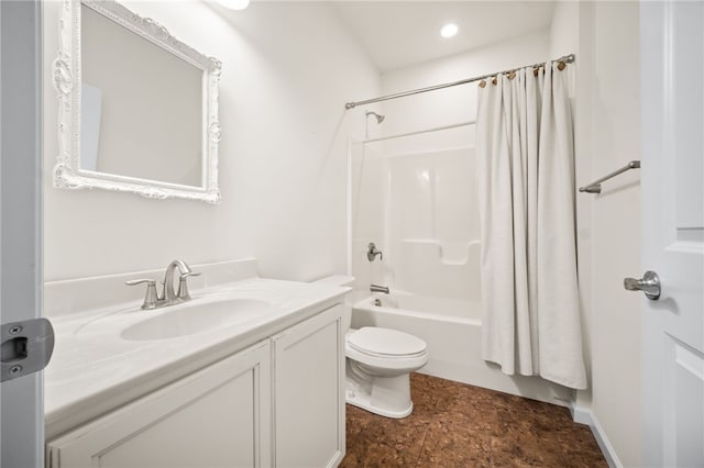 full bathroom with shower / tub combo with curtain, vanity, and toilet