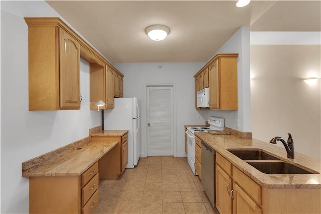 kitchen with sink, built in desk, light tile patterned floors, white appliances, and light stone countertops