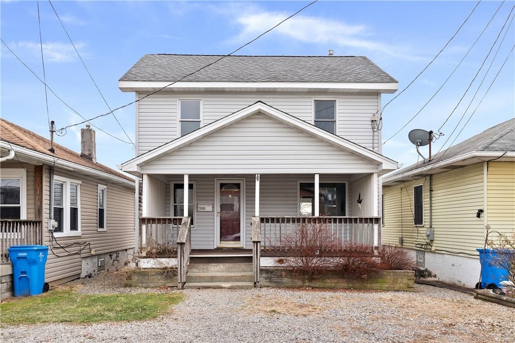 view of property with covered porch