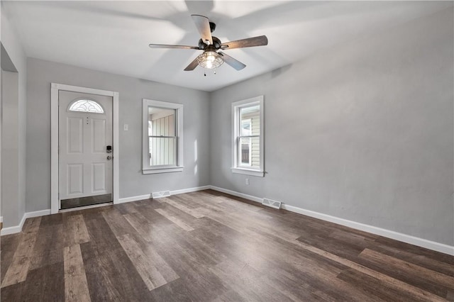 entrance foyer featuring dark wood-type flooring and ceiling fan