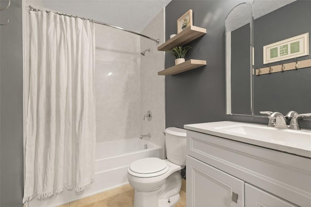 full bathroom featuring shower / bathtub combination with curtain, vanity, a textured ceiling, tile patterned floors, and toilet