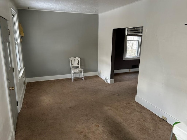 empty room with carpet floors