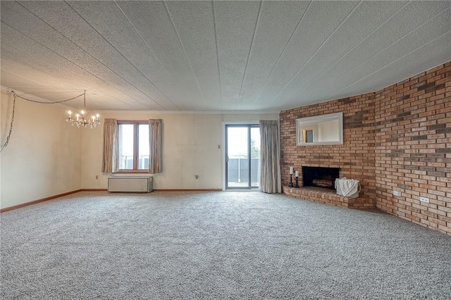 820 E Beau Unit 7Hr, South Strabane, PA 15301 - unfurnished living room with a chandelier, a fireplace, carpet floors, baseboards, and brick wall