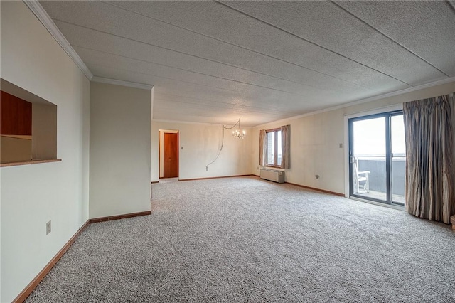 empty room with ornamental molding, carpet, a textured ceiling, and an inviting chandelier