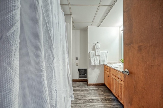 820 E Beau Unit 7Hr, South Strabane, PA 15301 - full bathroom with wood finished floors, vanity, baseboards, and a shower with shower curtain