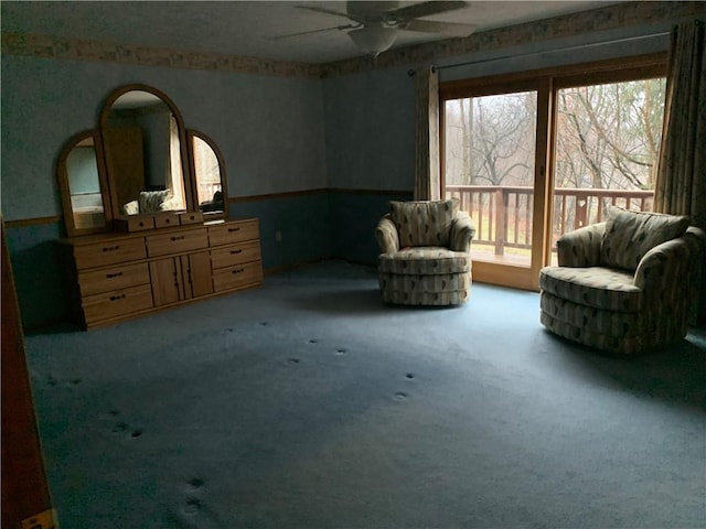 sitting room featuring carpet floors