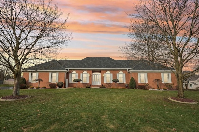 view of front of home featuring a yard