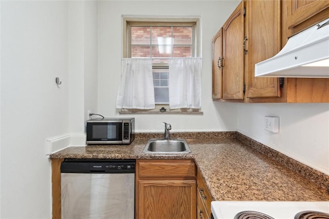 kitchen with appliances with stainless steel finishes and sink