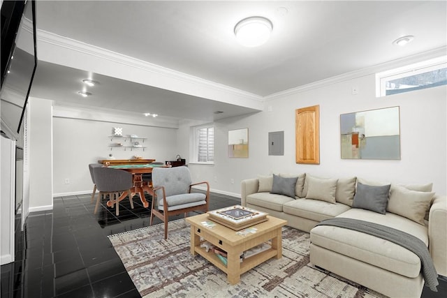 living room featuring crown molding, electric panel, and dark tile patterned flooring