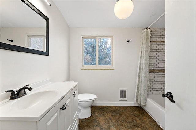 full bathroom featuring vanity, toilet, and shower / bath combo with shower curtain