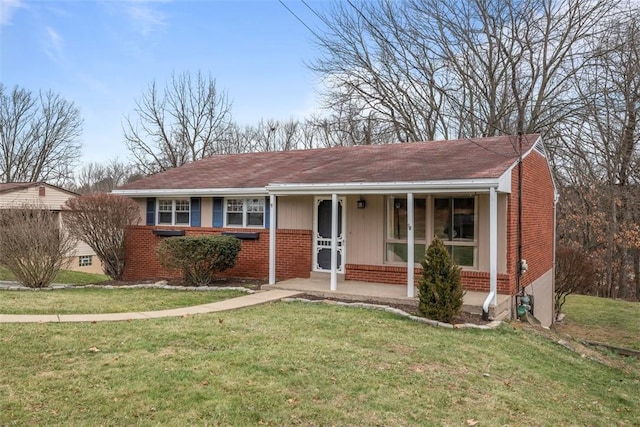 view of front of home with a porch and a front yard