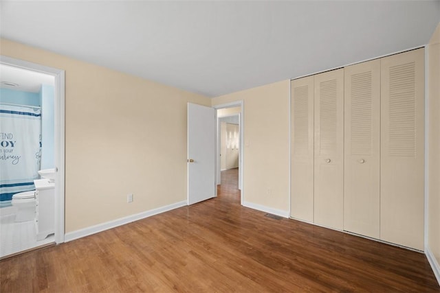 8422 Roosevelt Blvd, Mccandless, PA 15237 - unfurnished bedroom with wood finished floors, a closet, and connected bathroom