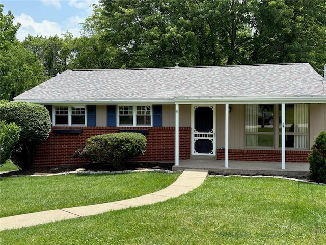 8422 Roosevelt Blvd, Mccandless, PA 15237 - ranch-style house with brick siding, a front yard, and covered porch