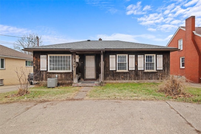 view of front of home featuring central AC unit