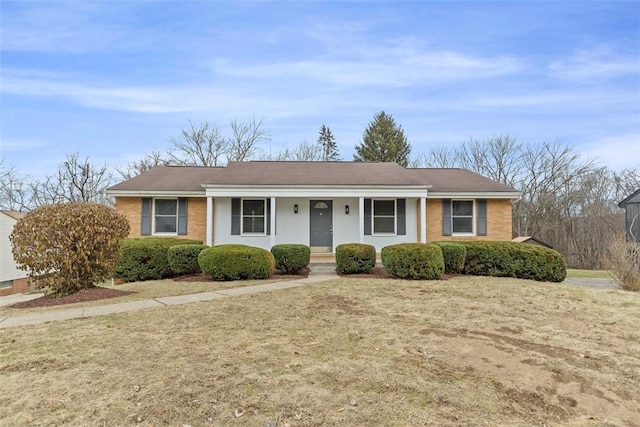 ranch-style house with a front yard